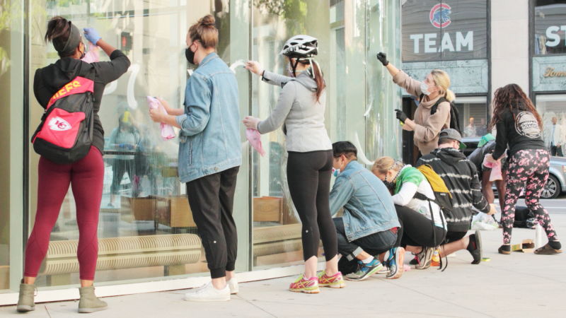 Volunteers clean up Michigan Ave. after protest